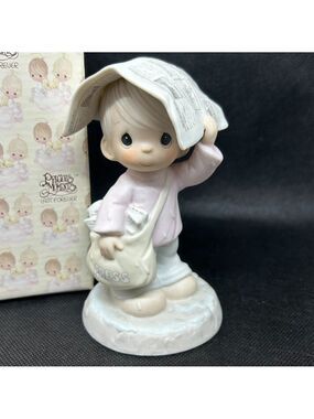 Precious Moments "Sending You Showers of Blessings" figurine